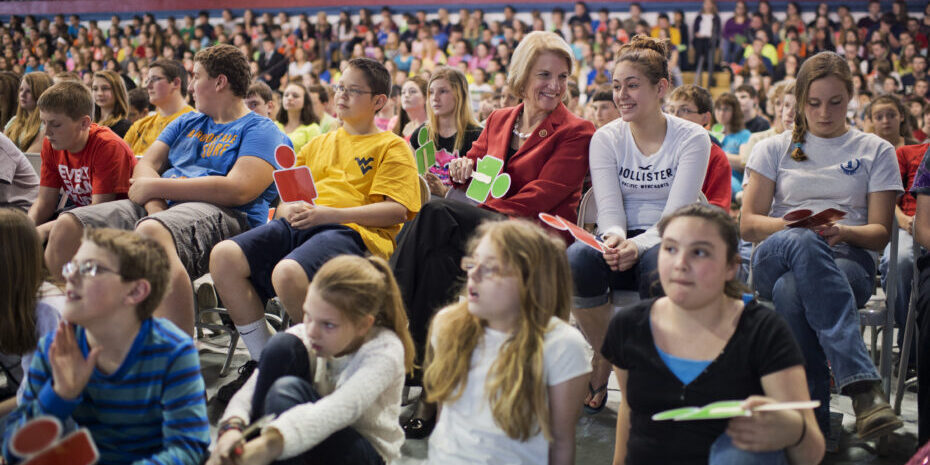 UNITED STATES - APRIL 15: Rep. Shelley Moore Capito, R-W.Va., who is running for the Senate in West Virginia, sits with students during an internet safety event sponsored by Google at Robert Bland Middle School in Weston, W.Va., April 15, 2014. (Photo By Tom Williams/CQ Roll Call) (CQ Roll Call via AP Images)